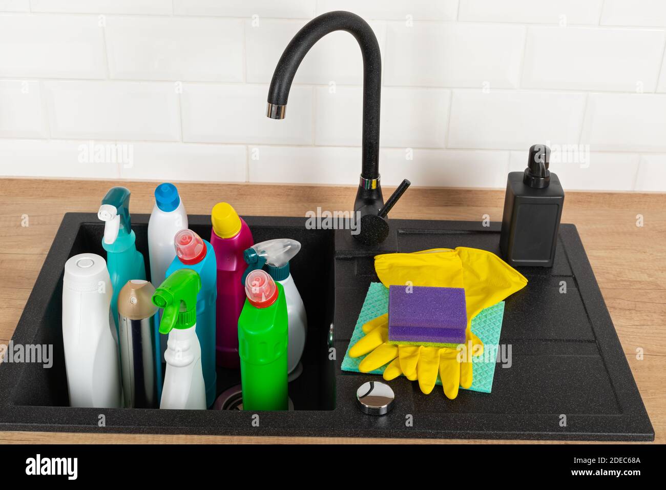 Colorful cleaning products in the kitchen Stock Photo Alamy