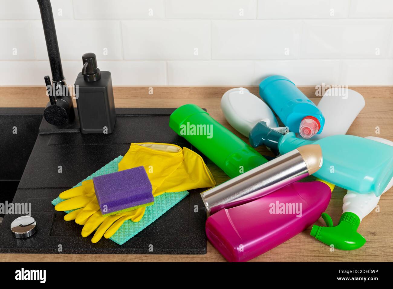 Colorful cleaning products in the kitchen Stock Photo Alamy