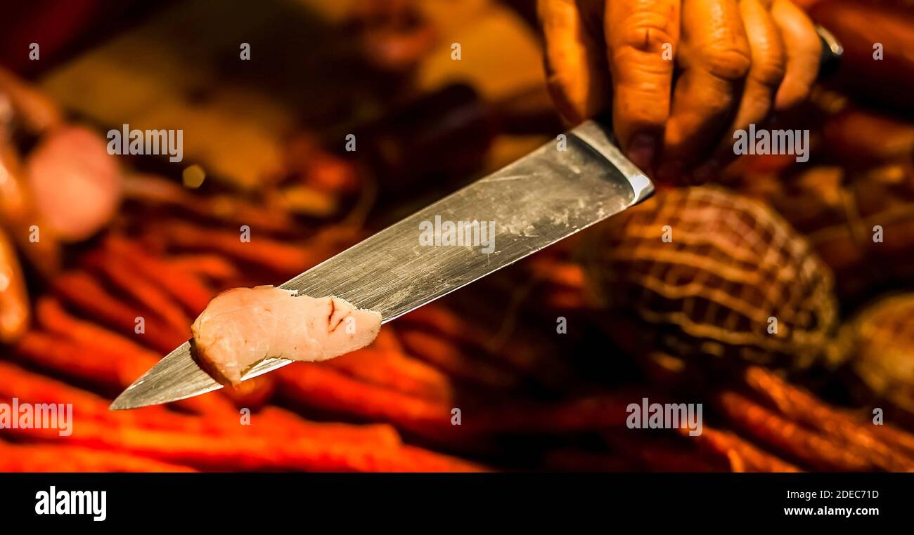 A closeup shot of slice of fresh cured cold meats Stock Photo