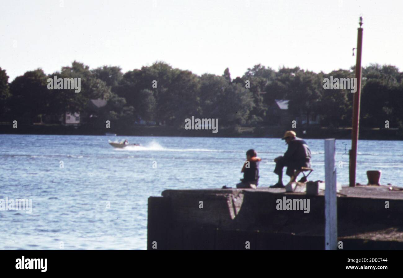 1970s Photo (1973) -  Fishing and boating on the Niagara River. Flowing from Lake Erie into Lake Ontario the river divides new york state from the Canadian province of Ontario Stock Photo