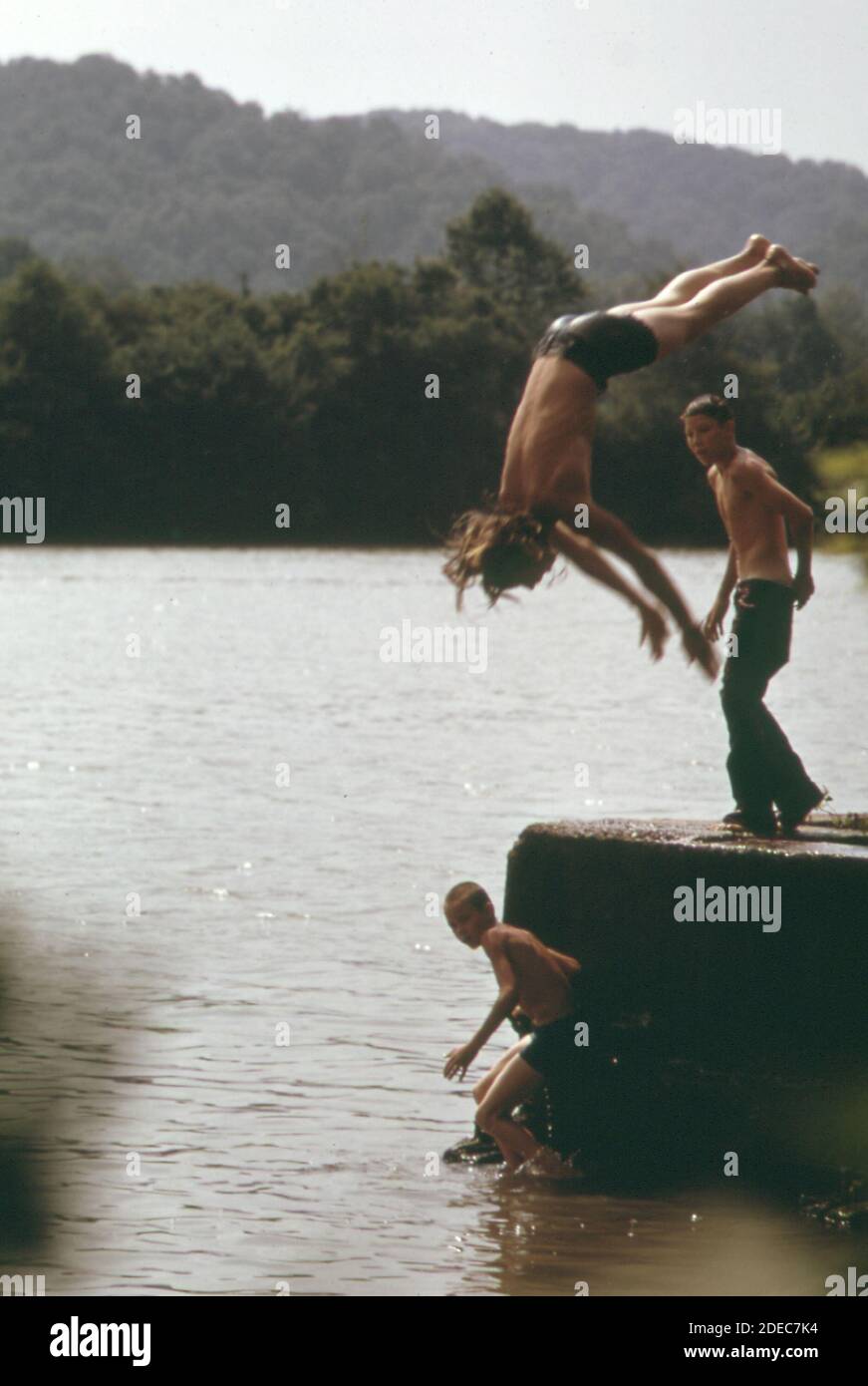 1970s teens diving into river hires stock photography and images Alamy