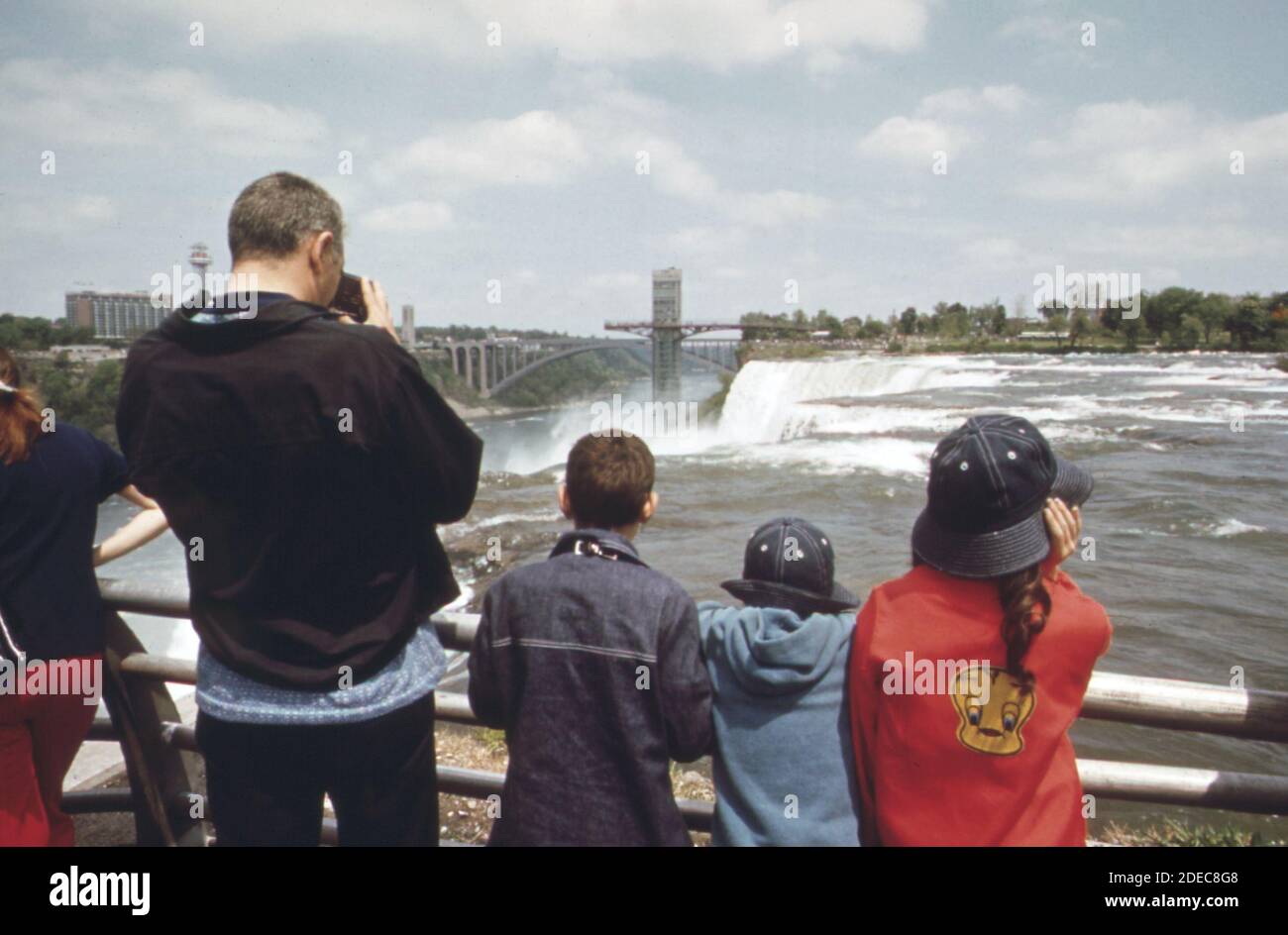 1970s Photo (1973) -  Tourists on Rainbow Bridge which spans the Niagara River just below the falls Stock Photo