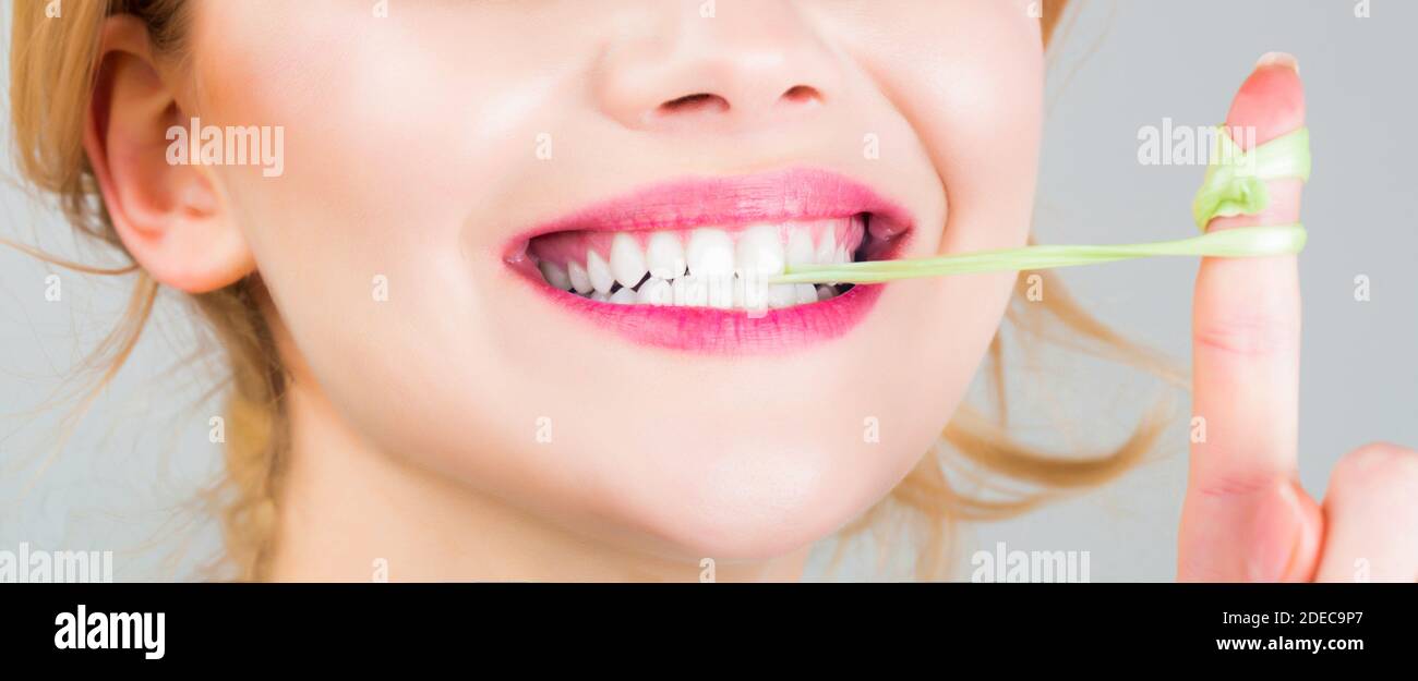 Bubble chewing girl, bubble gum portrait. Teeth whitening. Closeup face, smile. Woman makeup, bubblegum, gum. Stomatology concept. White teeth Stock Photo
