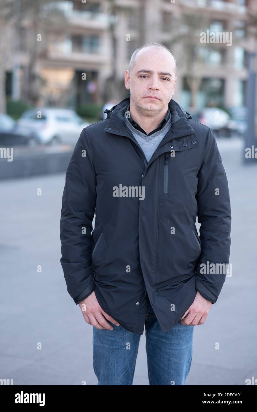 45 years old man standing outdoors Stock Photo