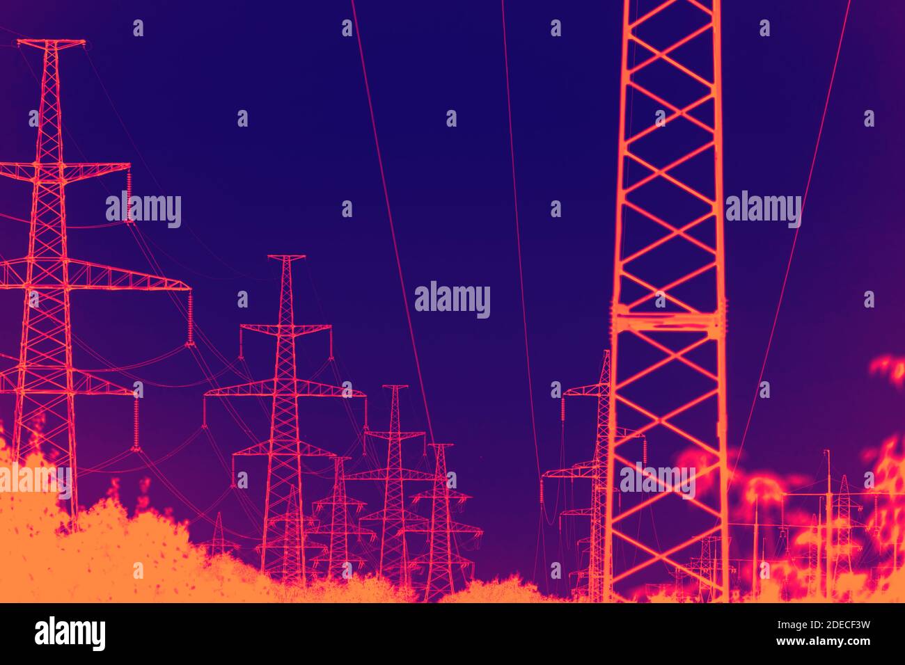 infrared view of high voltage tower. industrial high voltage lines.  Stock Photo