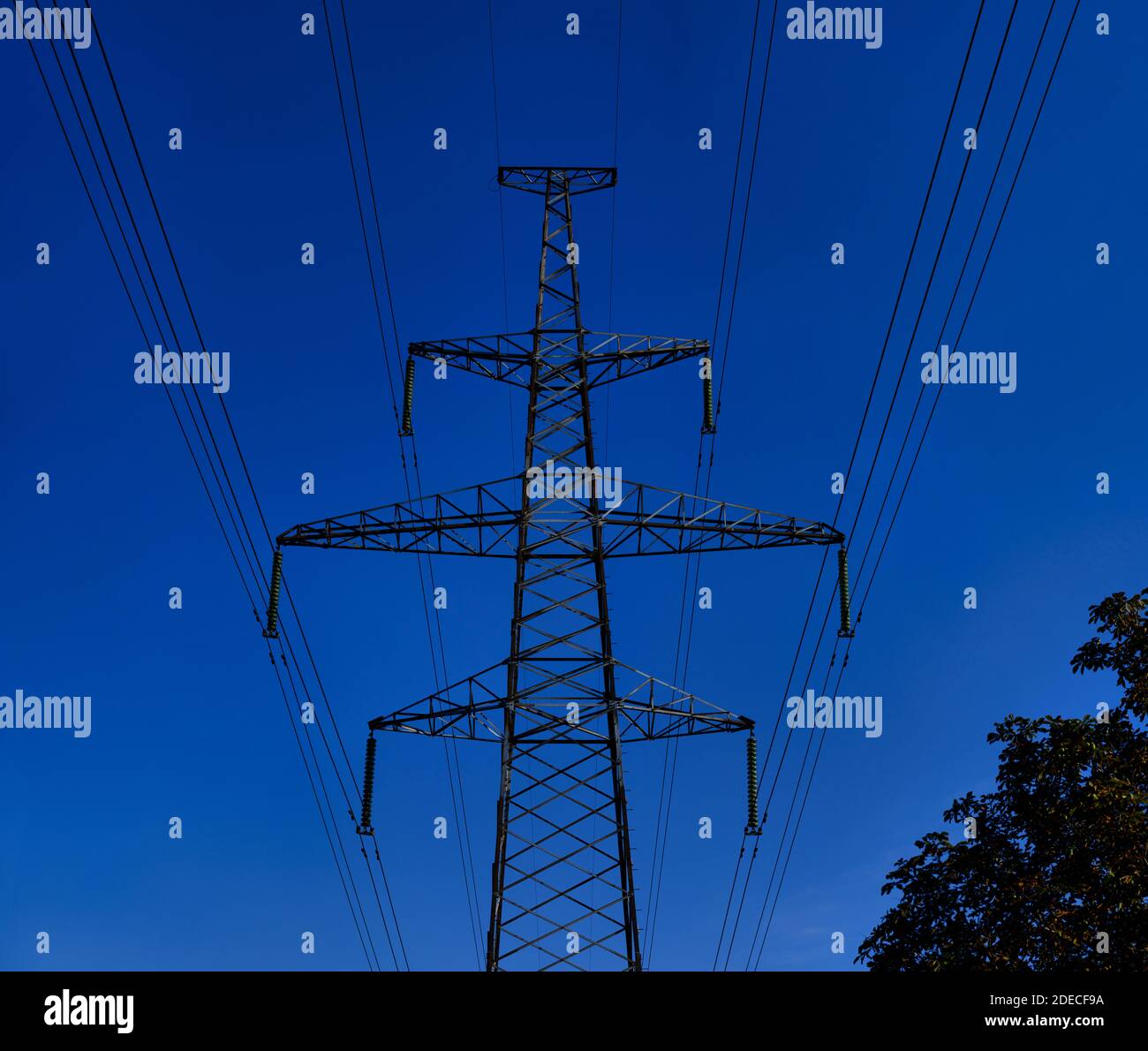 Big High voltage tower with power line cables. industrial view of high