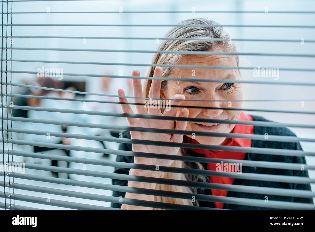 peeping-through-blinds-hi-res-stock-photography-and-images-alamy