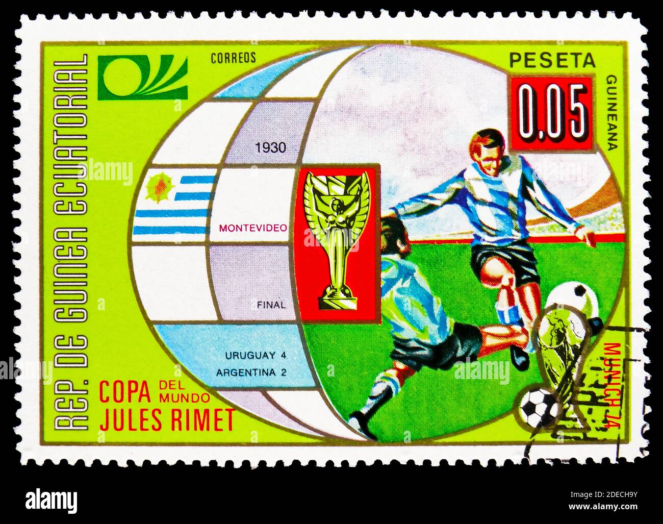 MOSCOW, RUSSIA - OCTOBER 17, 2020: Postage stamp printed in Equatorial Guinea shows Montevideo, Football World Cup 1974, Germany: Earlier World Cup fi Stock Photo