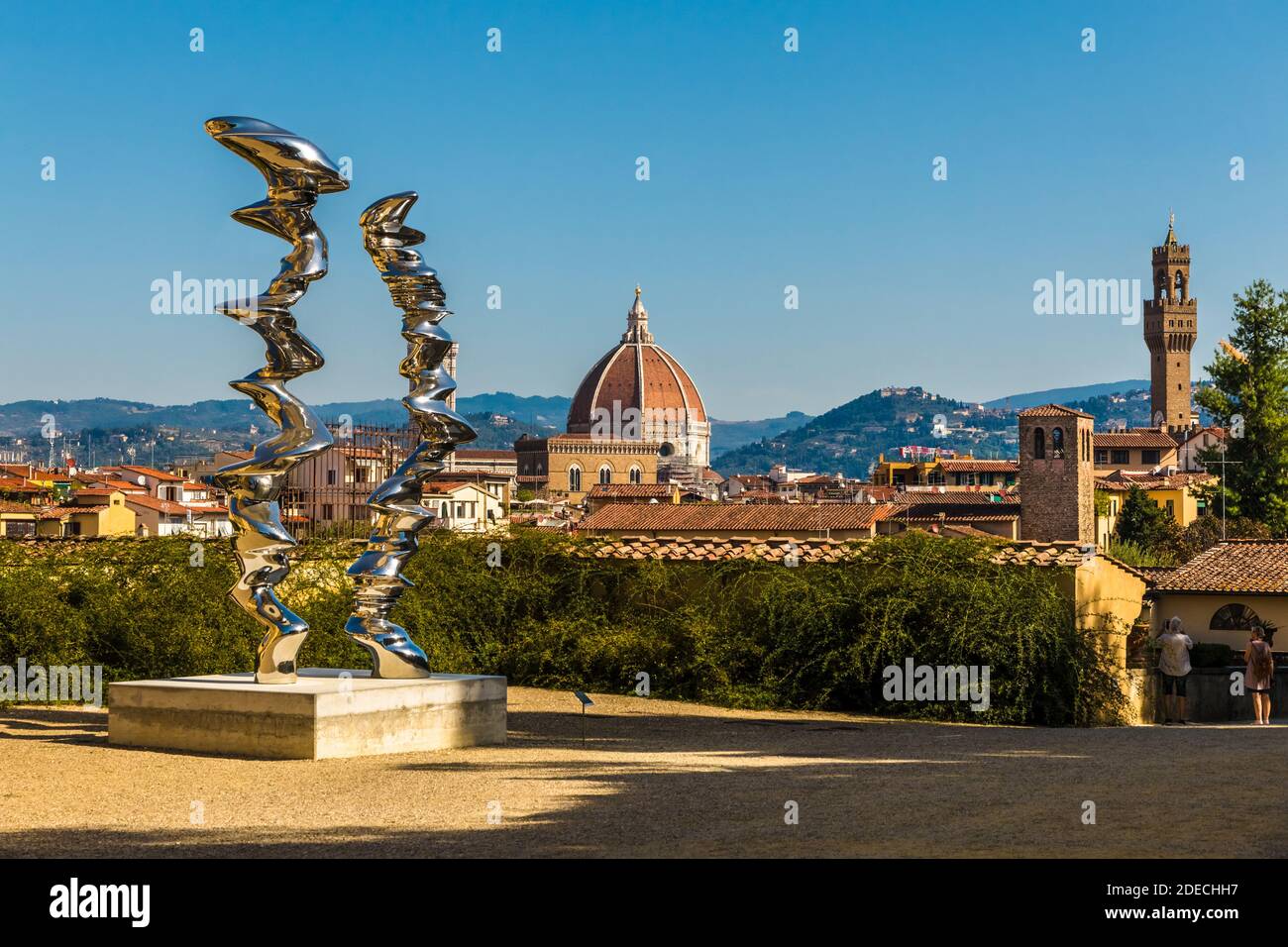 Gorgeous panoramic rooftop view of Florence with the stainless steel sculptures Elliptical Column and Points of View by Tony Cragg in front. The Duomo... Stock Photo