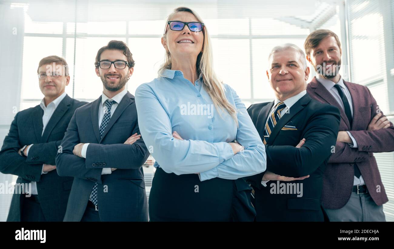 group of happy business people standing in the office Stock Photo - Alamy