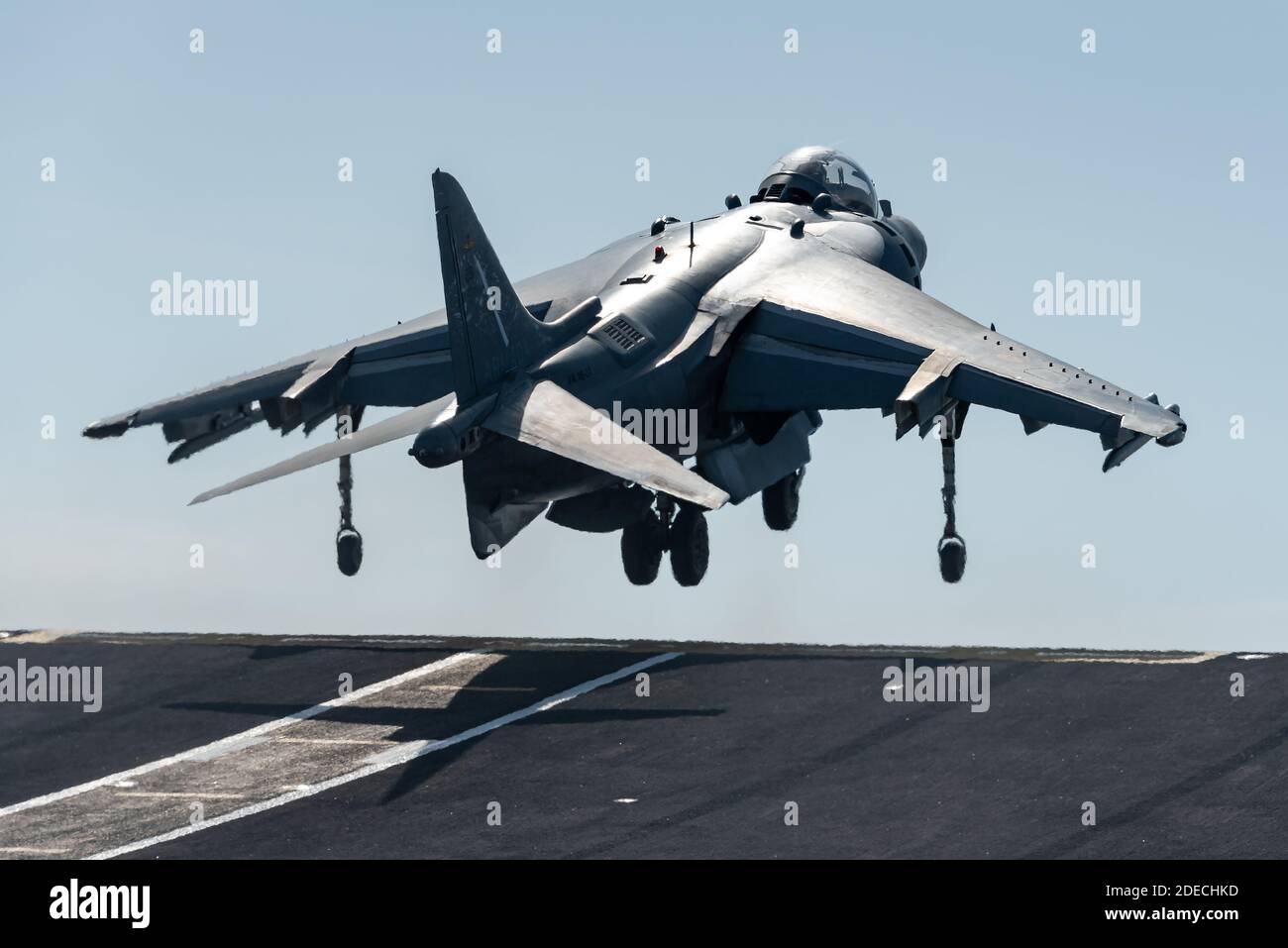 A McDonnell Douglas AV-8B Harrier II fighter jet of the Spanish Navy at the Juan Carlos aircraft carrier and helicopter landing deck. Stock Photo