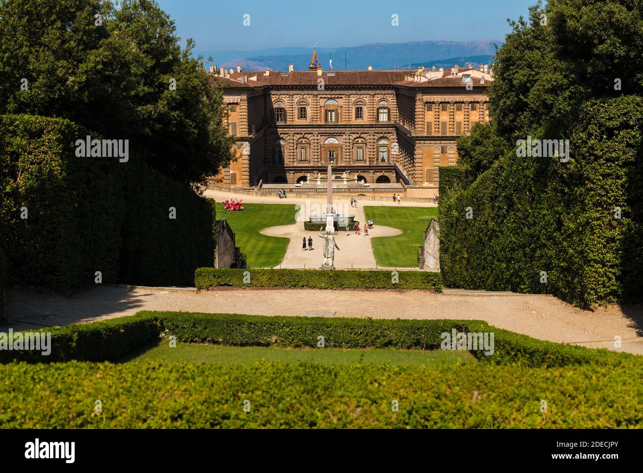 Gorgeous view of the Palazzo Pitti and the ancient Egyptian red granite obelisk and granite basin taken from the Fountain of Neptune between the... Stock Photo