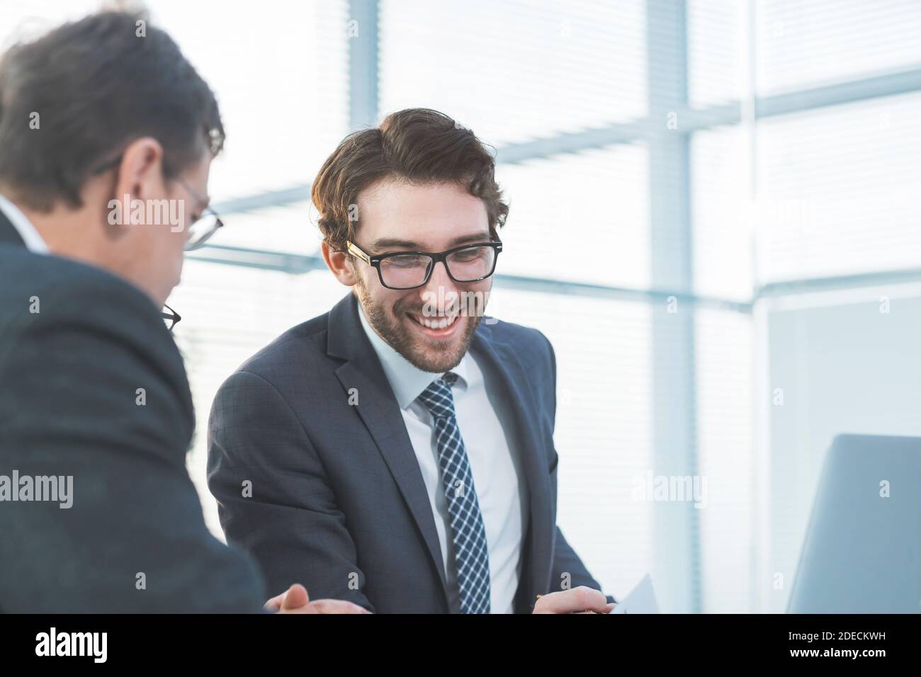 close up . young employee analyzing new information Stock Photo