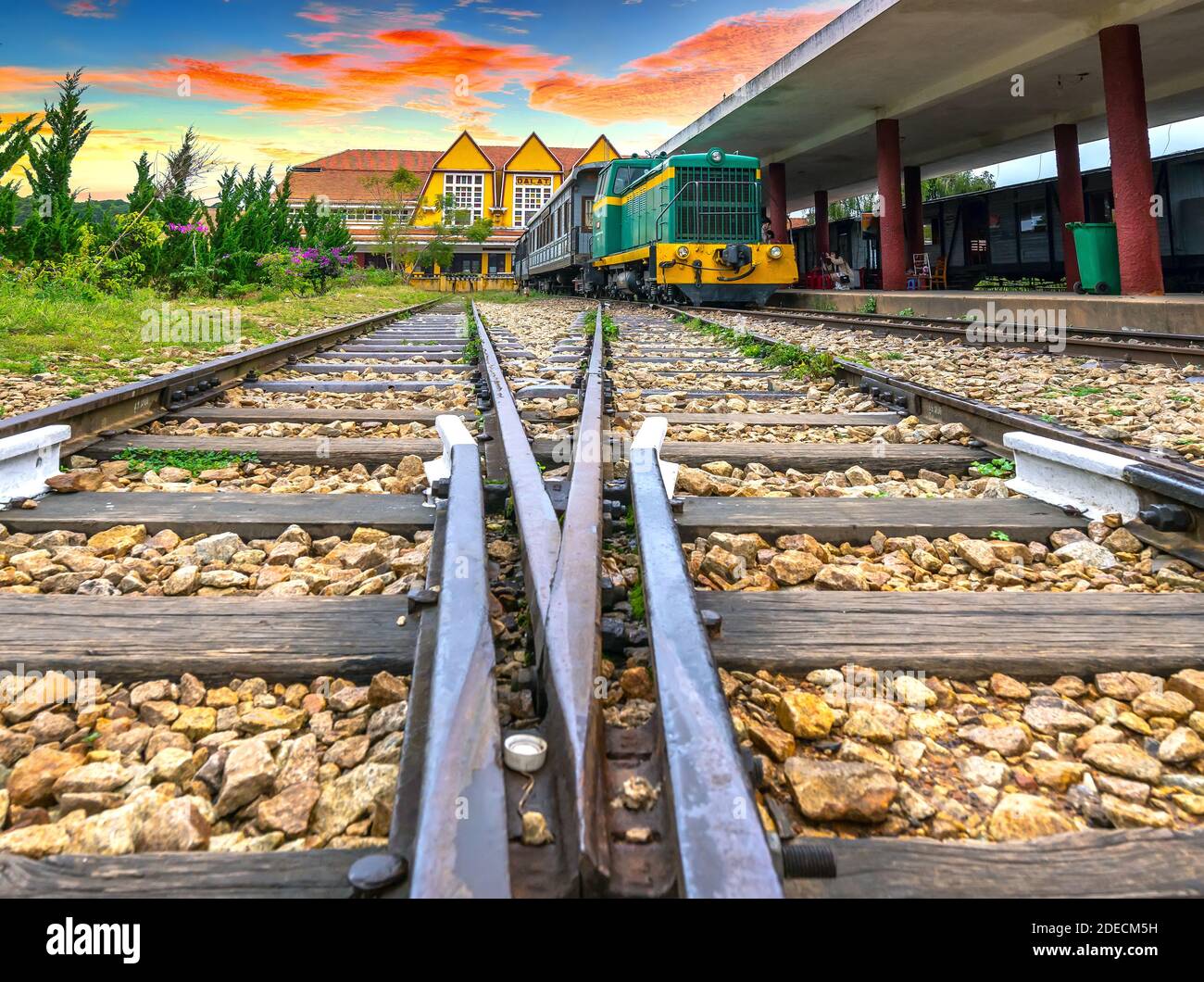 Ancient railway station, French architecture in sunny autumn attracts