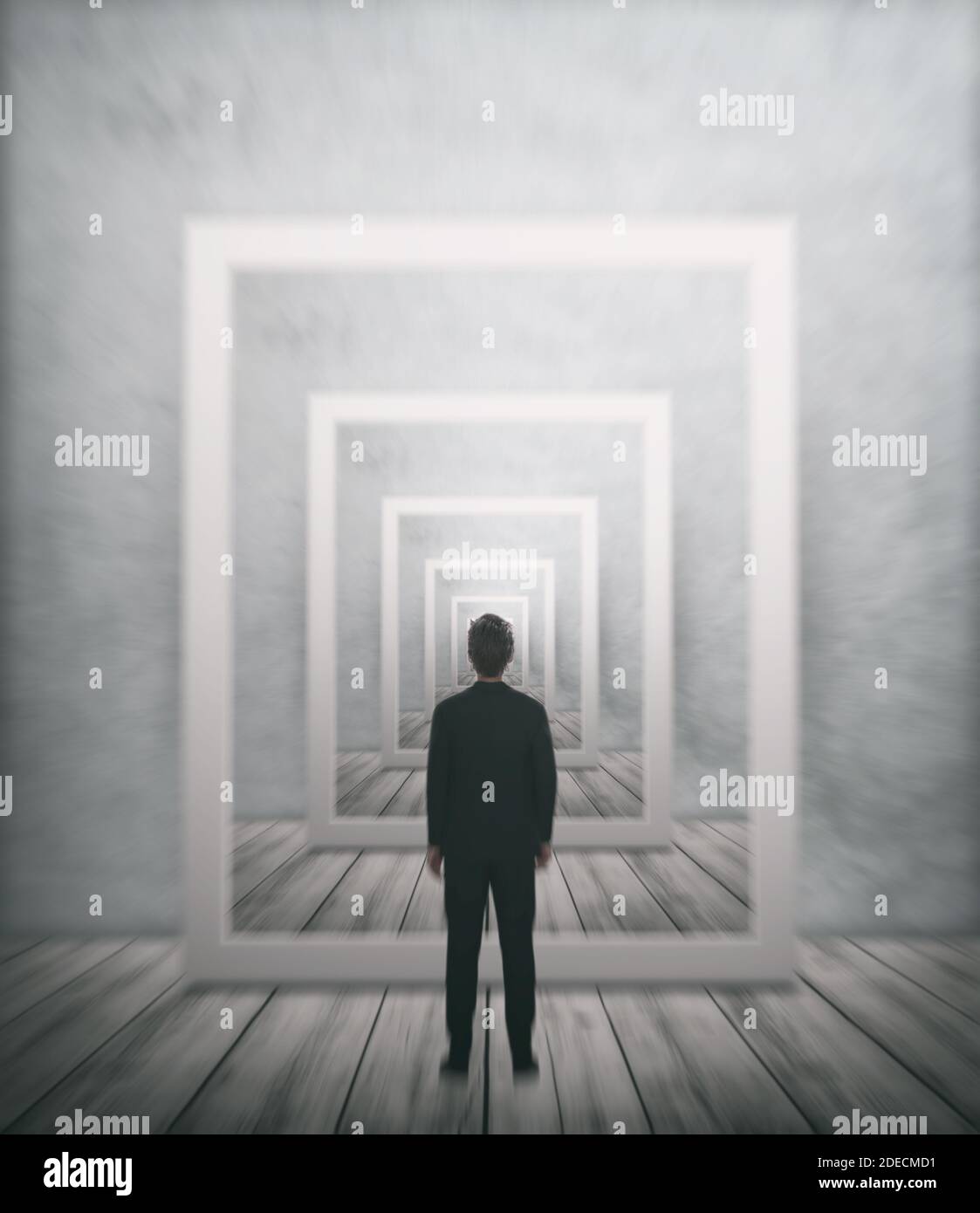 Business man standing in front of endless repeating picture frame, motion blur effect Stock Photo