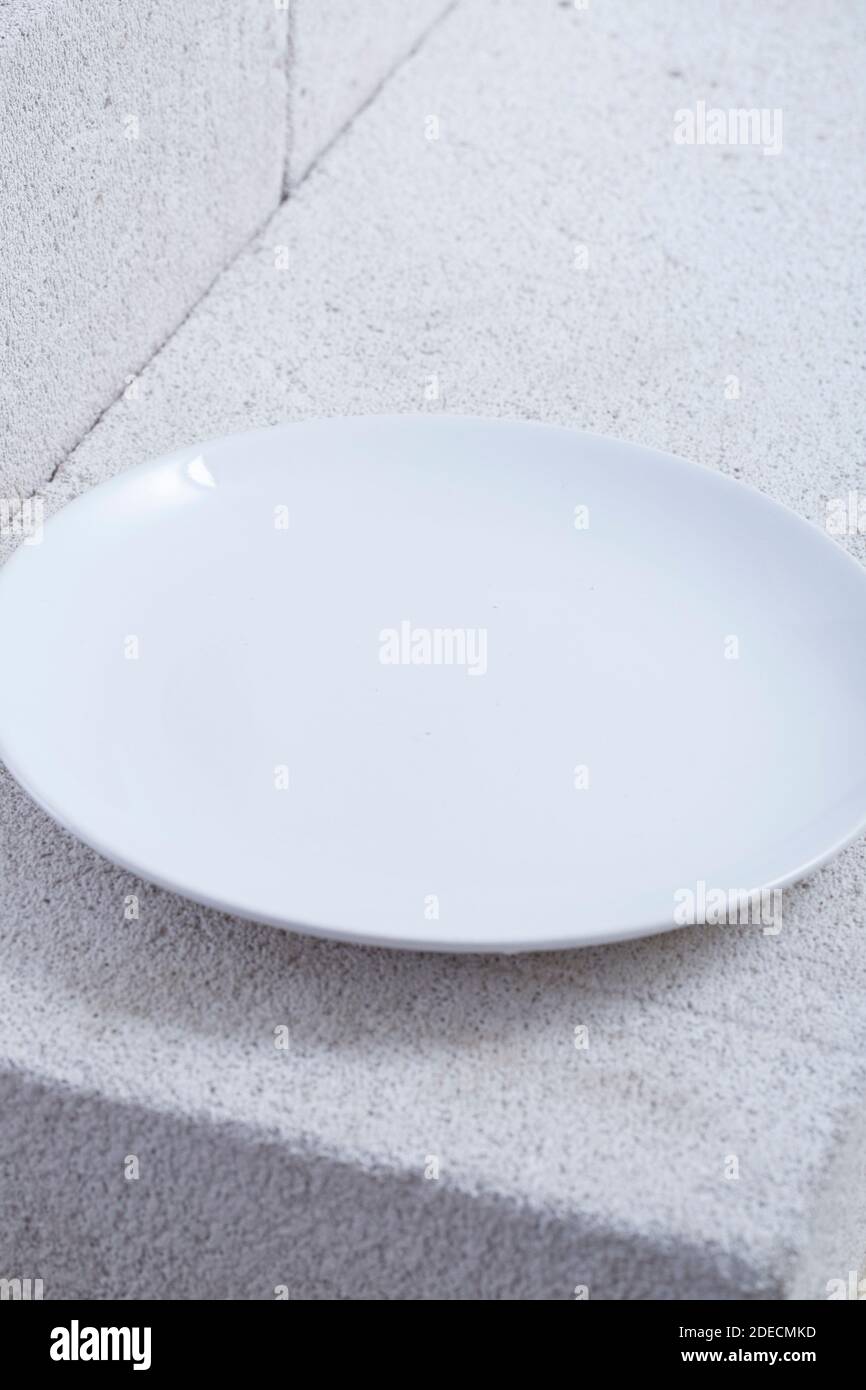 empty plate and fork. On a white background. Stock Photo