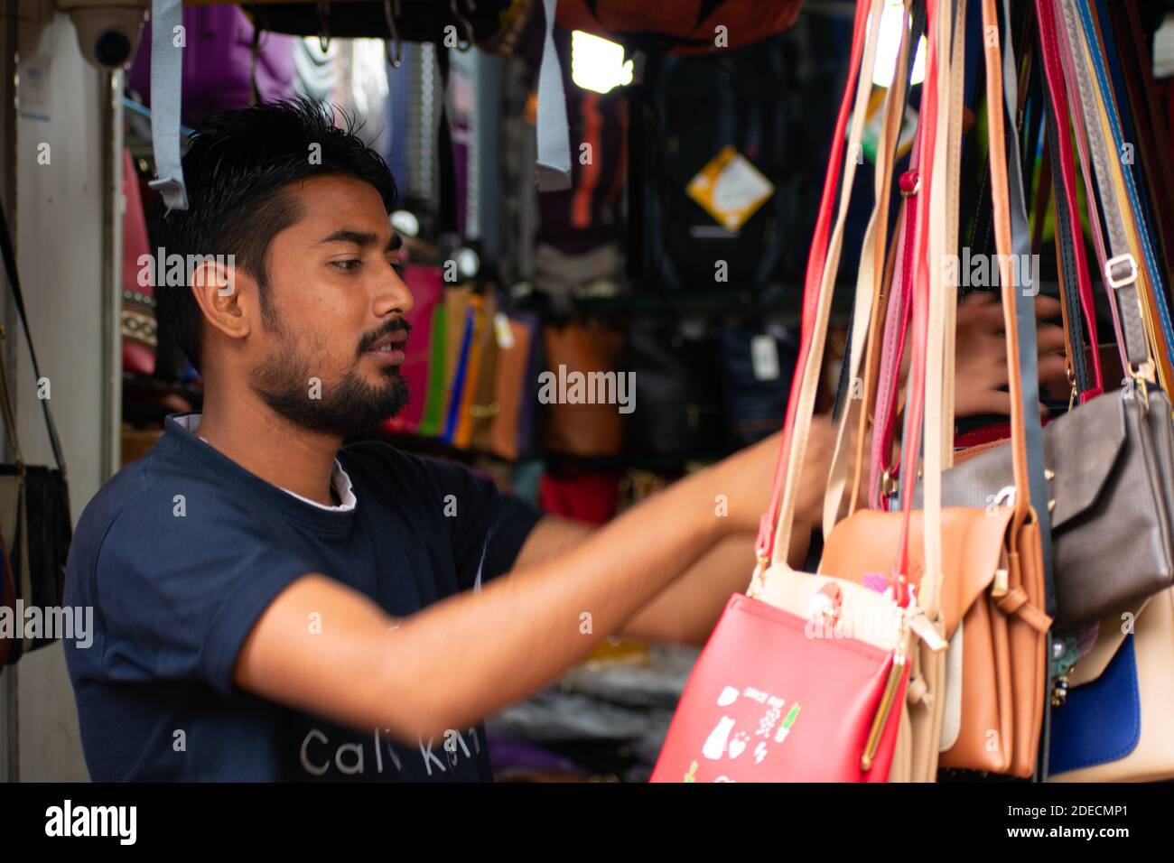 Bangalore, India - August 12, 2018: Streetside seller selling handmade  traditional bags at commercial street this morning Stock Photo - Alamy