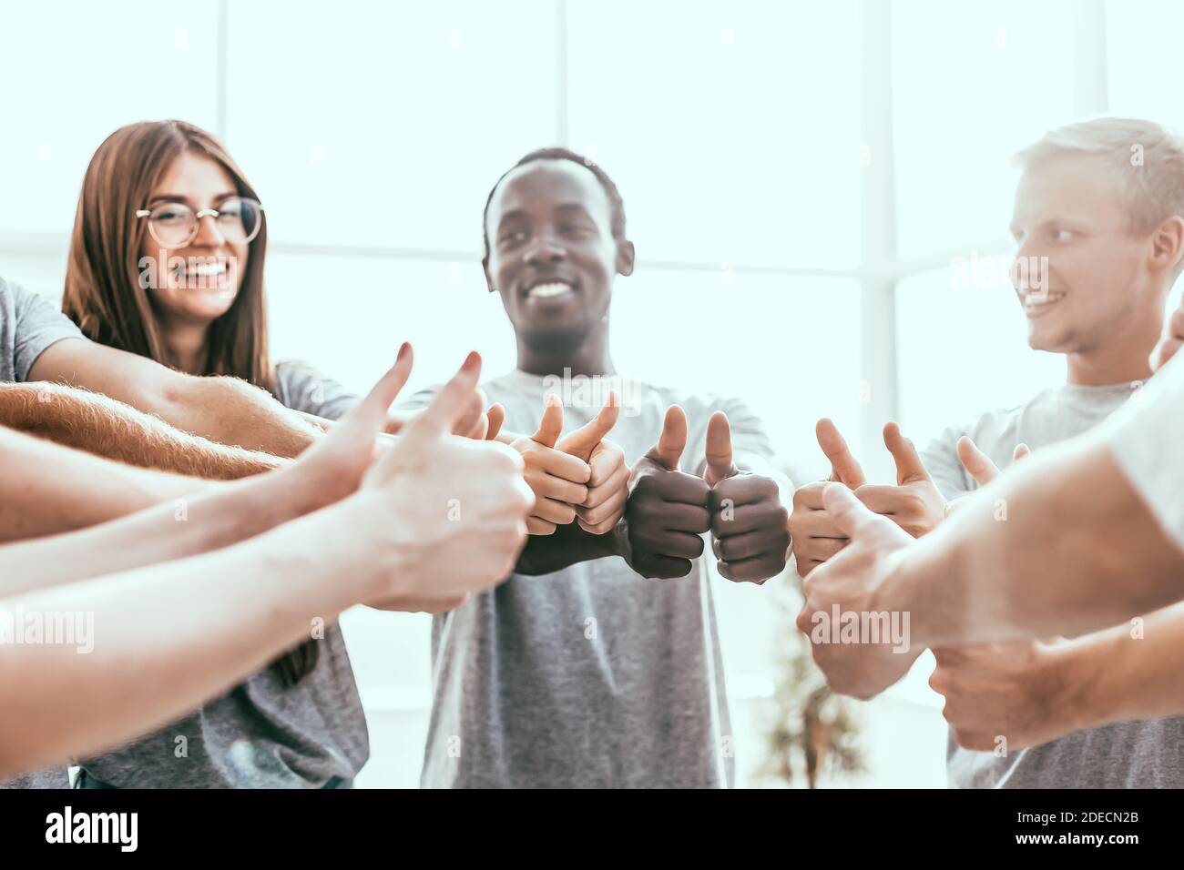 close up. group of like-minded showing thumbs up. Stock Photo