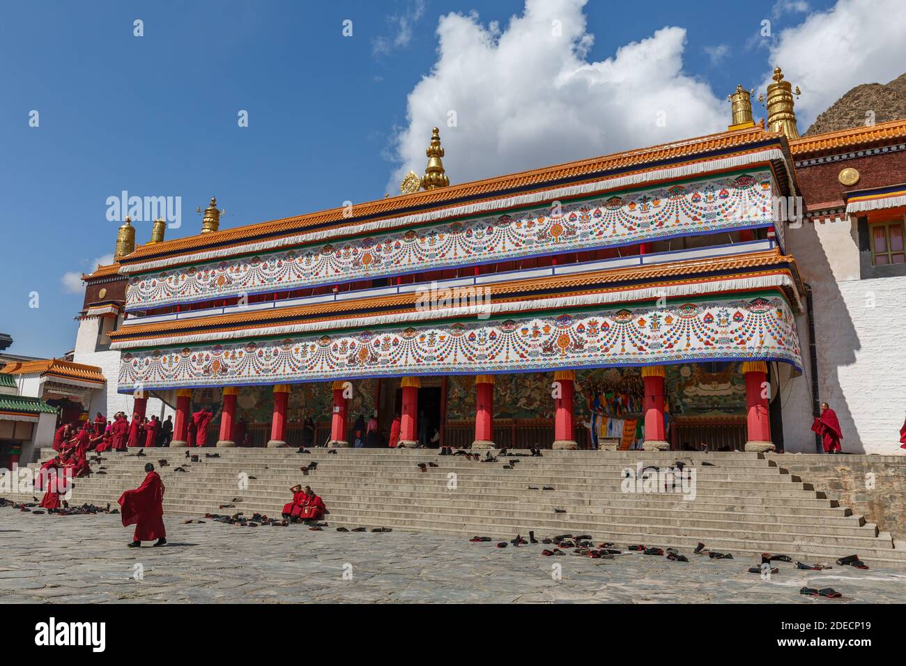 Xiahe, Gansu Province / China - April 28, 2017: View on richly ornamented building inside Labrang monastery. Largest tibetan monastery outside of Tibe Stock Photo