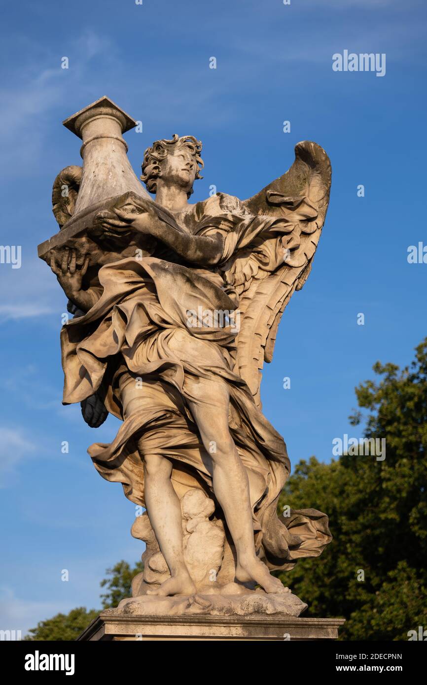 Angel with the Column on Ponte Sant Angelo bridge in Rome, Italy. Marble sculpture from 17th century by Antonio Raggi Stock Photo