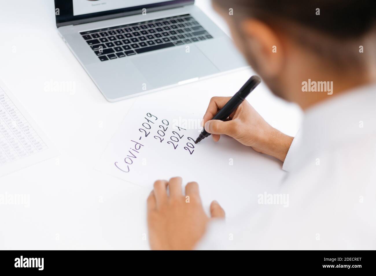 business analyst making notes about business development . Stock Photo