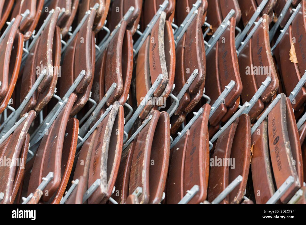 Munich, Bavaria / Germany - Nov 12, 2020: Close up of folded beer garden chairs. Captured during the November lockdown (Covid-19 / Coronavirus). Stock Photo