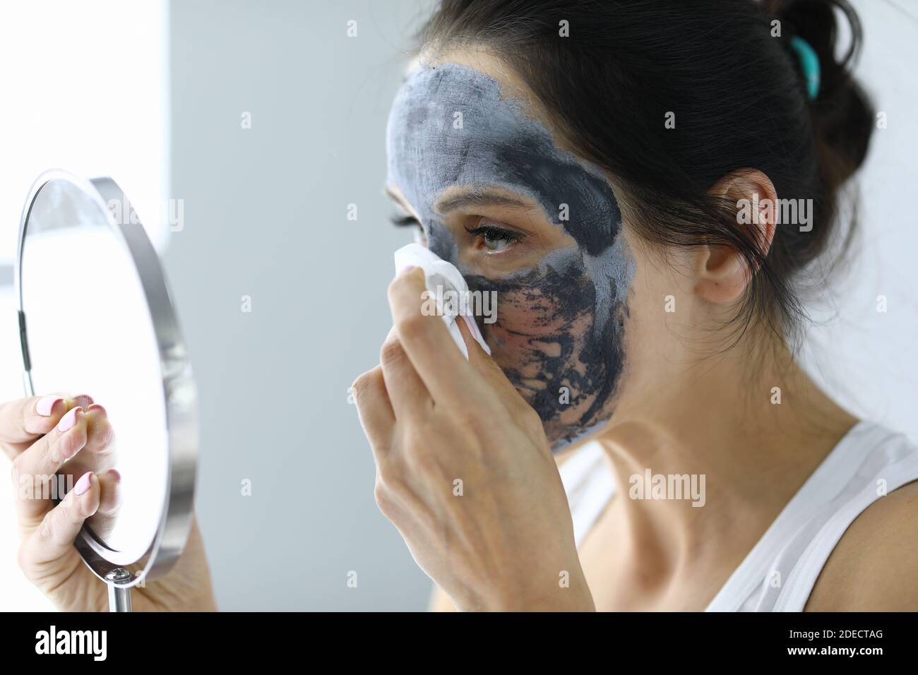 Woman takes off medical mask hi-res stock photography and images - Alamy