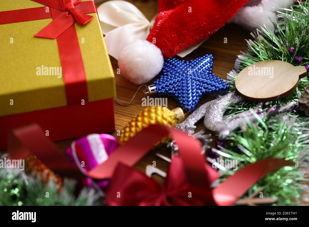 There are New Year's decorations and gift on table. Stock Photo