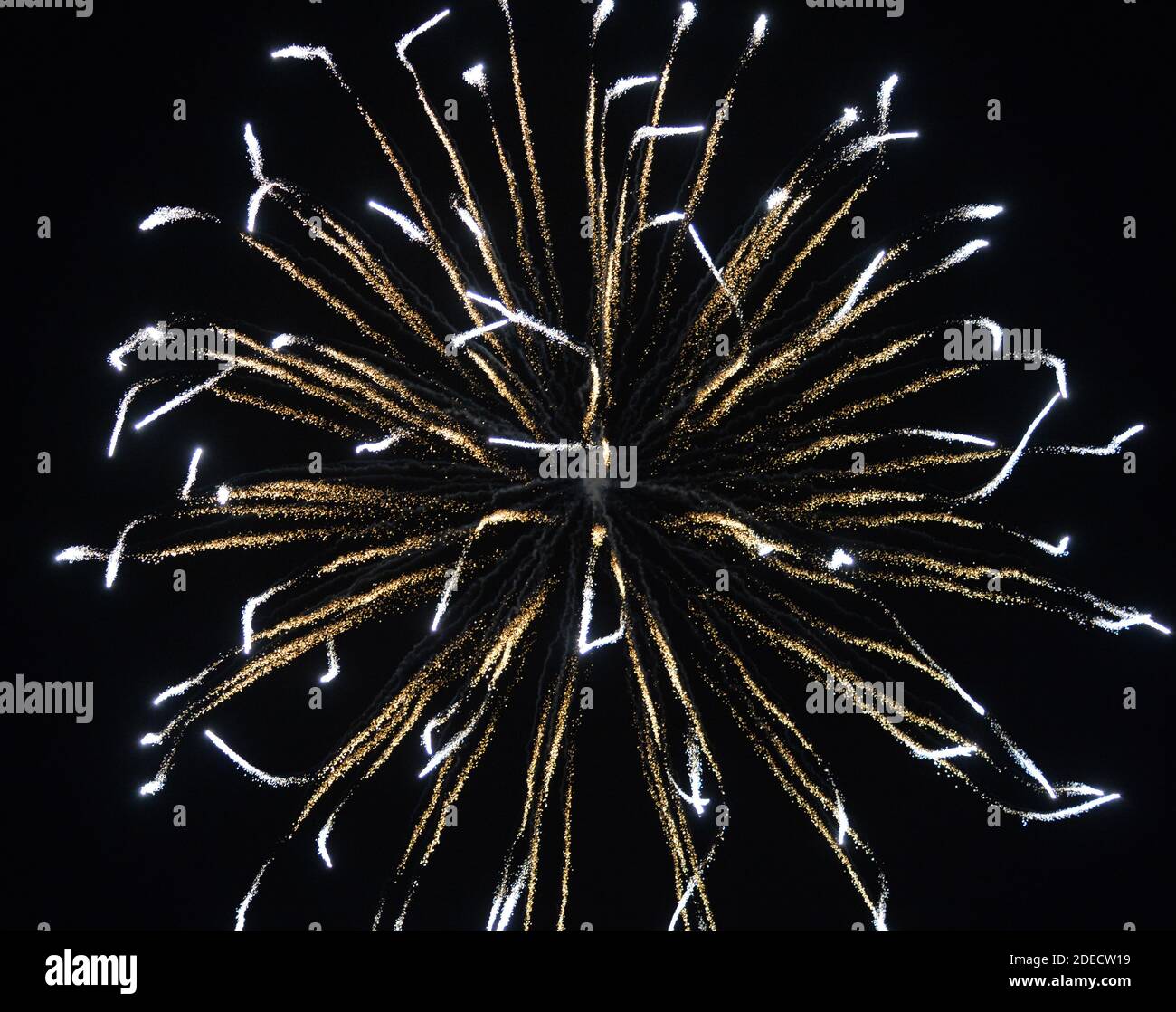 fireworks are a class of low explosive pyrotechnic devices used for aesthetic and entertainment purposes. Stock Photo