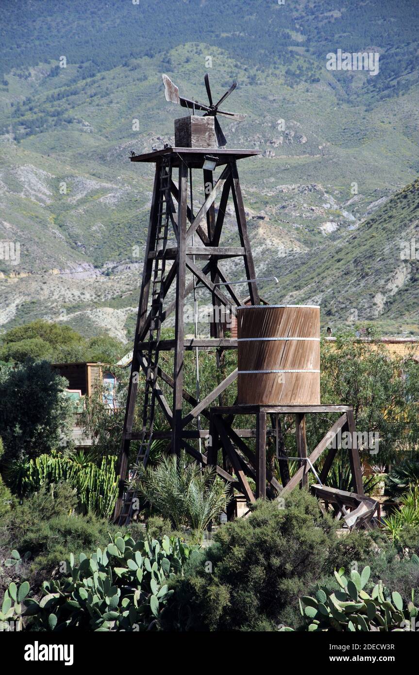 Wooden water pump in Fort Apache at Mini Hollywood with mountains to
