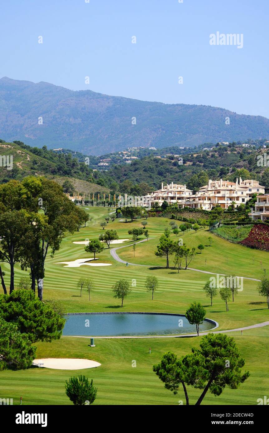 Elevated view of  El Higueral Golf Course with mountains to the rear, Benahavis, Spain. Stock Photo