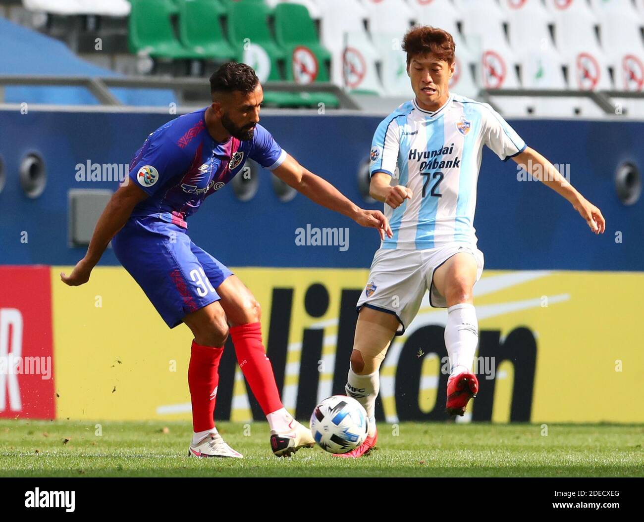 Soccer Football Afc Champions League Group F Tokyo V Ulsan Hyundai Education City Stadium Ar Rayyan Qatar November 30 Tokyo S Joan Oumari In Action With Ulsan Hyundai S