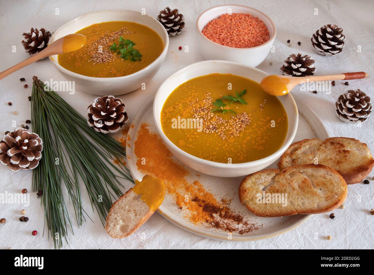 Orange soup in a bowl, pumpkin, carrot or coral lentils Stock Photo