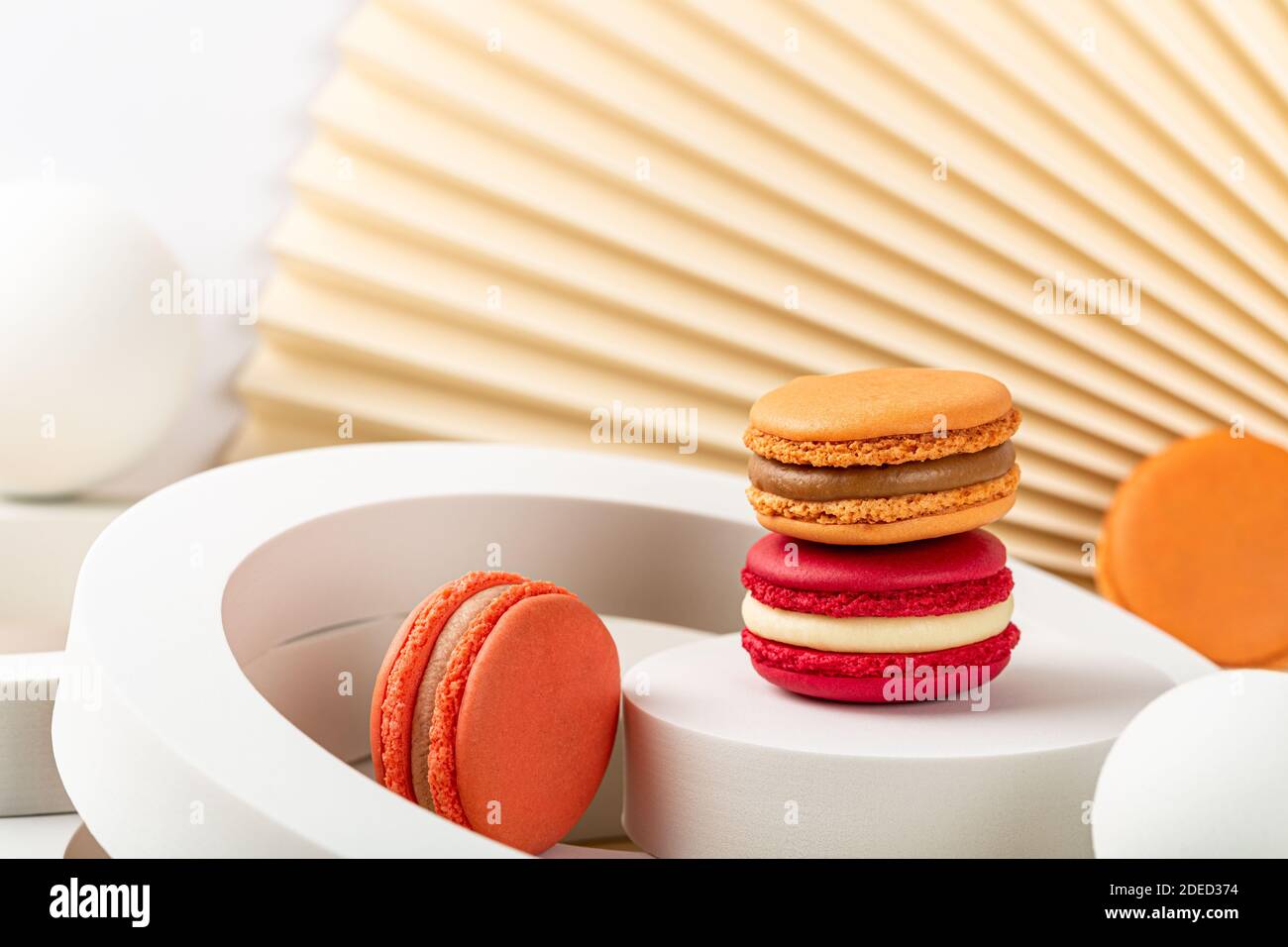 Cake macaron or macaroon on beige background Stock Photo