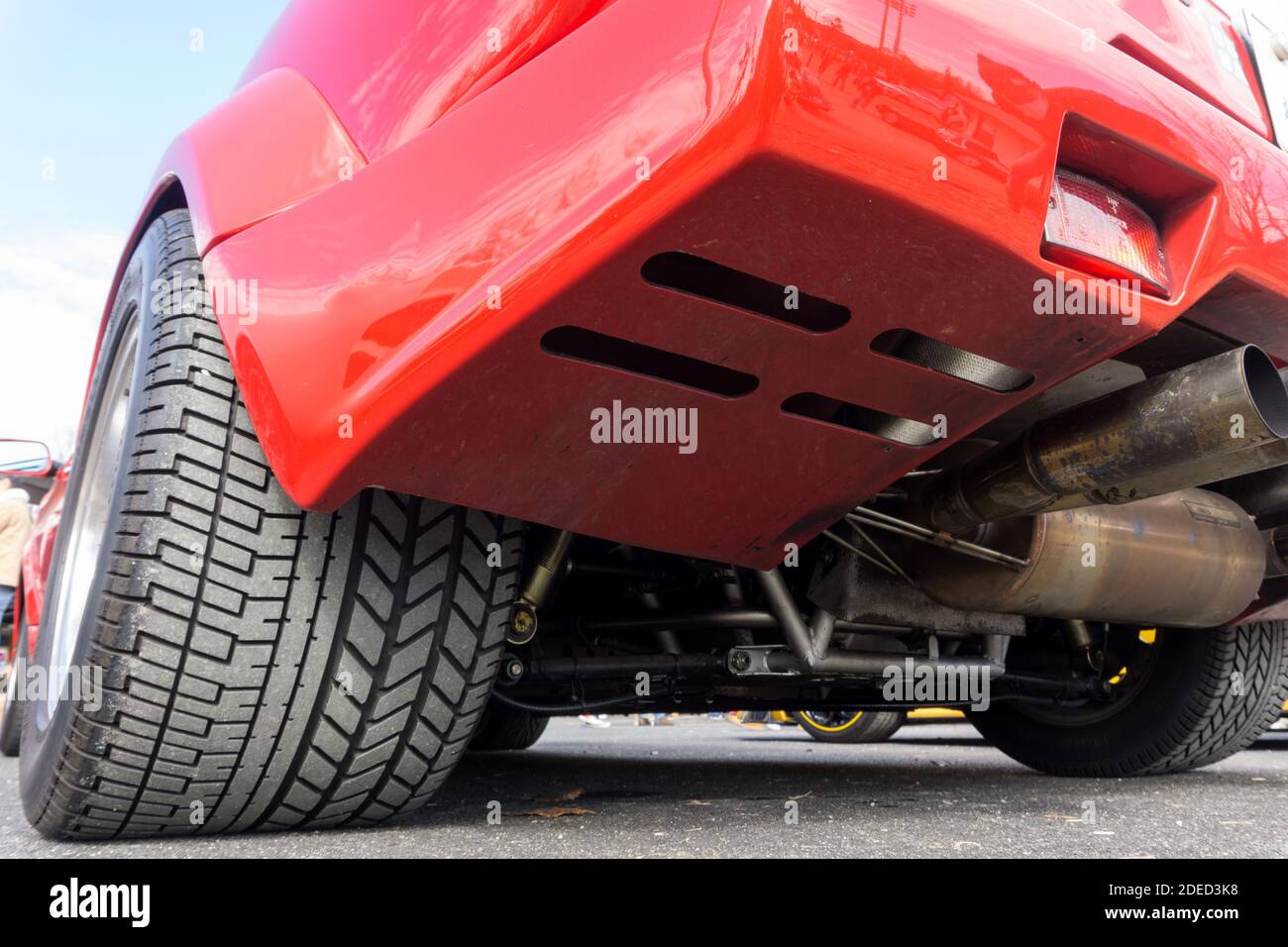 Close up detail under the rear of a red Countach 25th