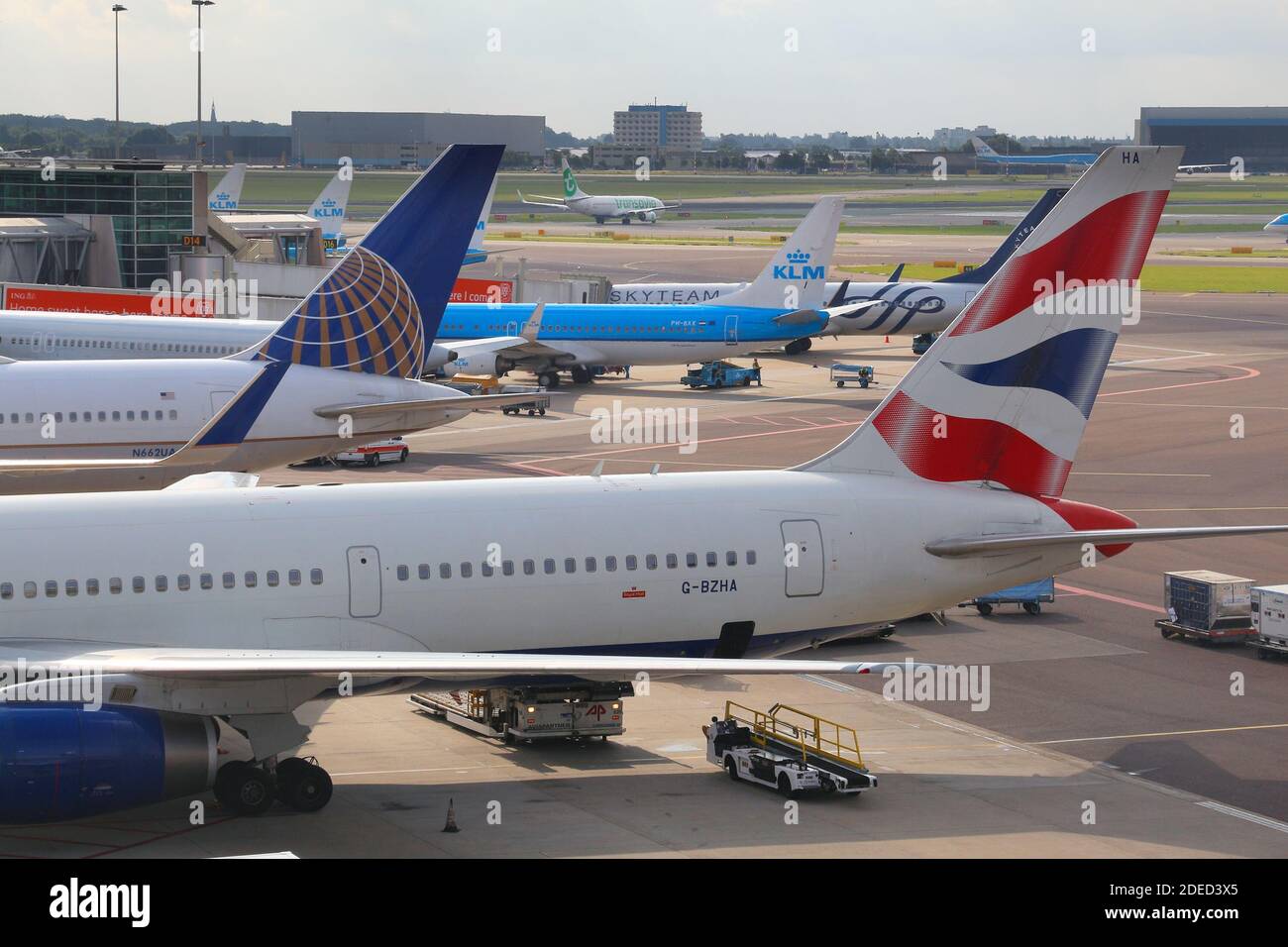 AMSTERDAM, NETHERLANDS - JULY 11, 2017: Airlines at Schiphol Airport in Amsterdam. Schiphol is the 12th busiest airport in the world with more than 63 Stock Photo