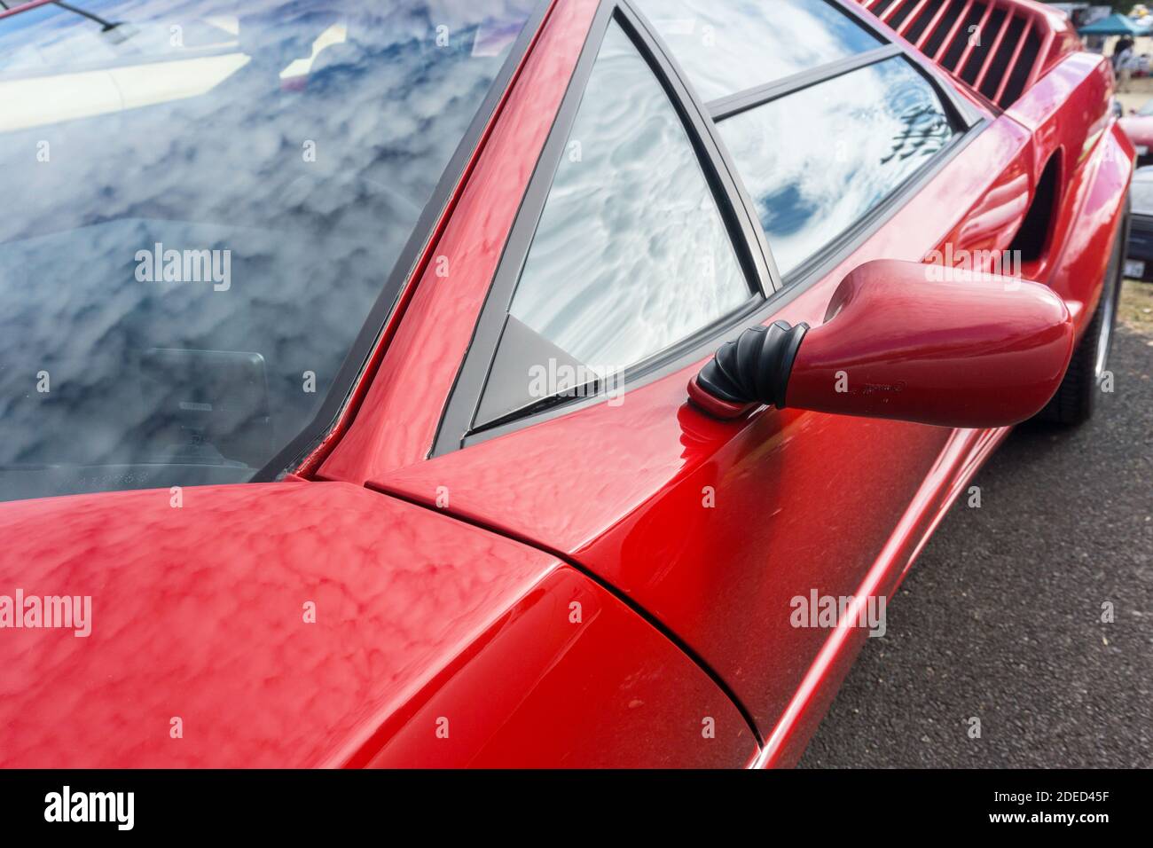 Close up detail of the door and side windows on a red