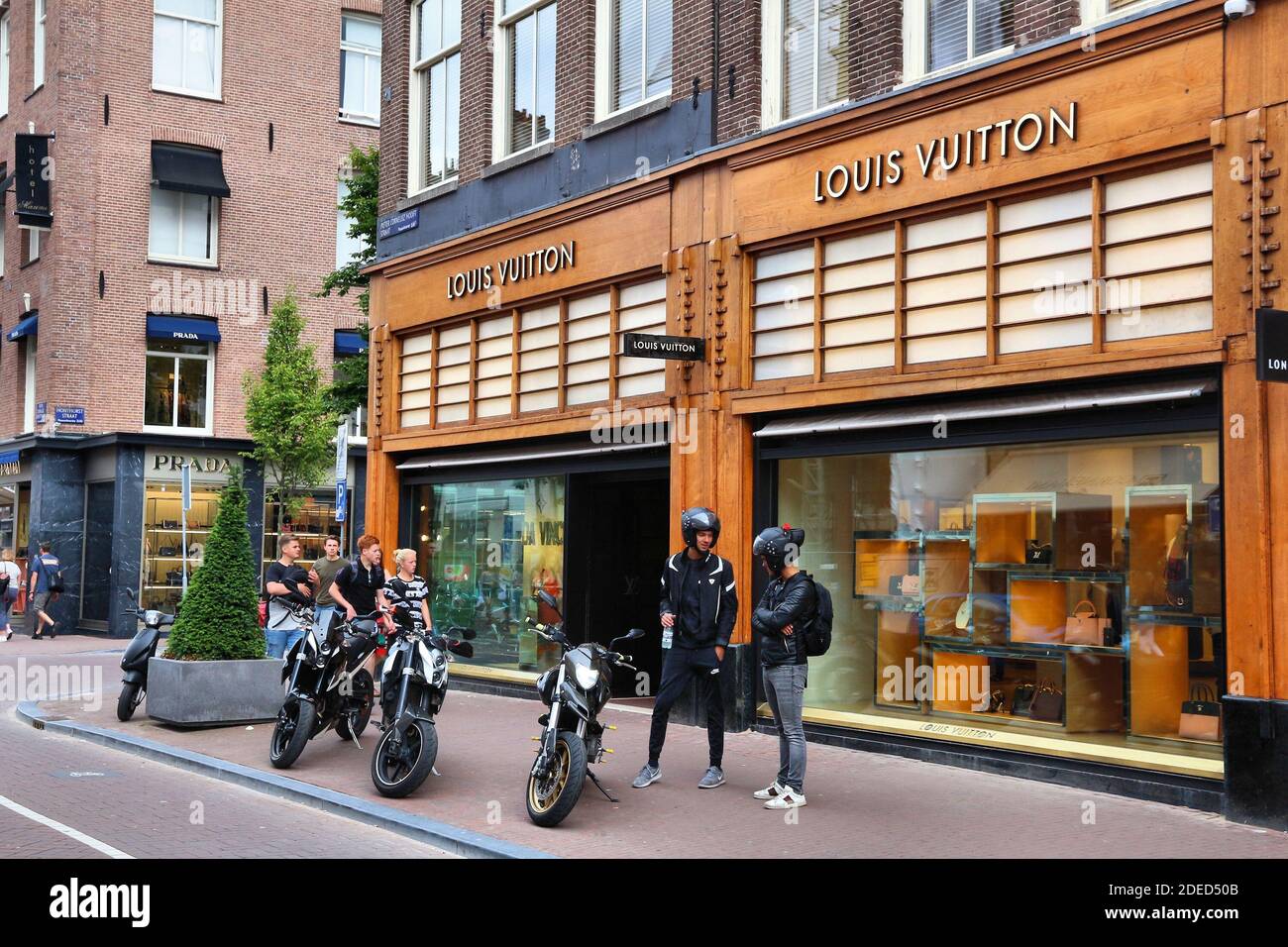 AMSTERDAM, - JULY 10, 2017: People visit Louis Vuitton fashion shop at P.C. in Amsterdam. Pieter Cornelis Hooftstraat the u Stock Photo - Alamy