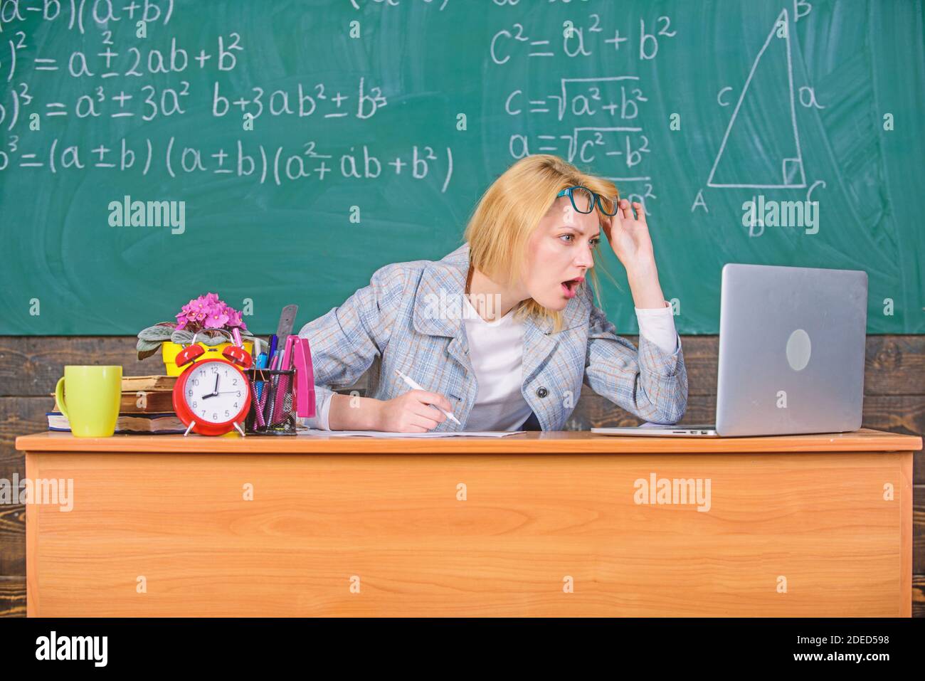 Teacher Shocked Face Keep Working After Classes Teacher Woman Sit Table Classroom Chalkboard