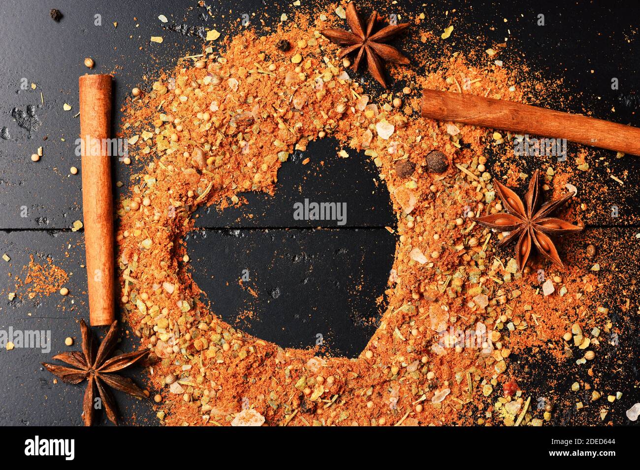 Food art concept. Set of spices on dark grey texture background ...