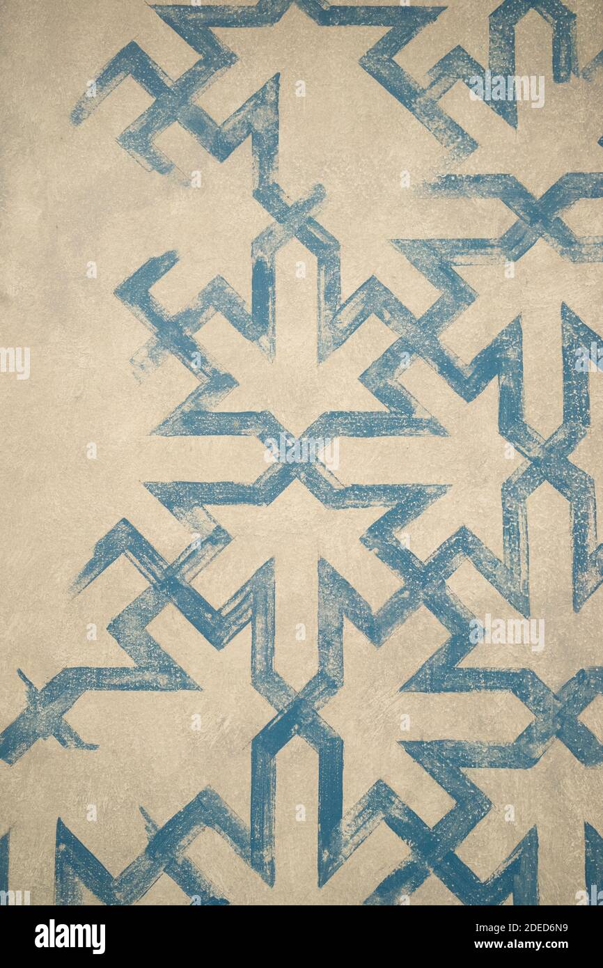 blue paint geometrical pattern on cream background retro Stock Photo