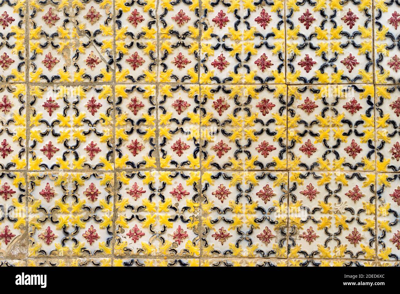 Portuguese ceramic red yellow tiles Stock Photo - Alamy