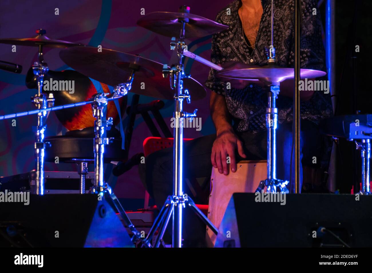 Man playing drums on stage of ethnic open air concert Stock Photo - Alamy