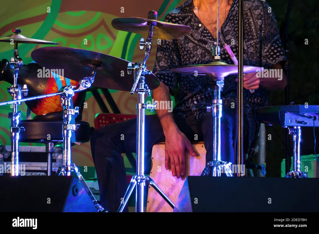 Man playing drums on stage of ethnic open air concert Stock Photo - Alamy