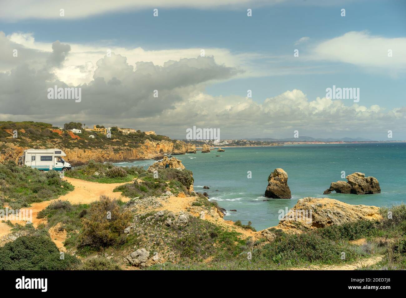 Camper van parked on a beach Stock Photo - Alamy