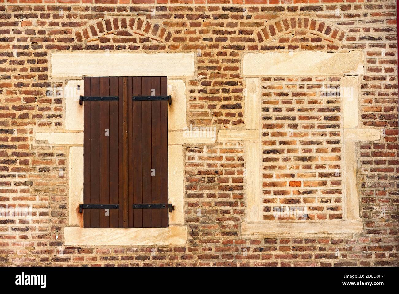 walled window with bricks and wood shutter Stock Photo - Alamy