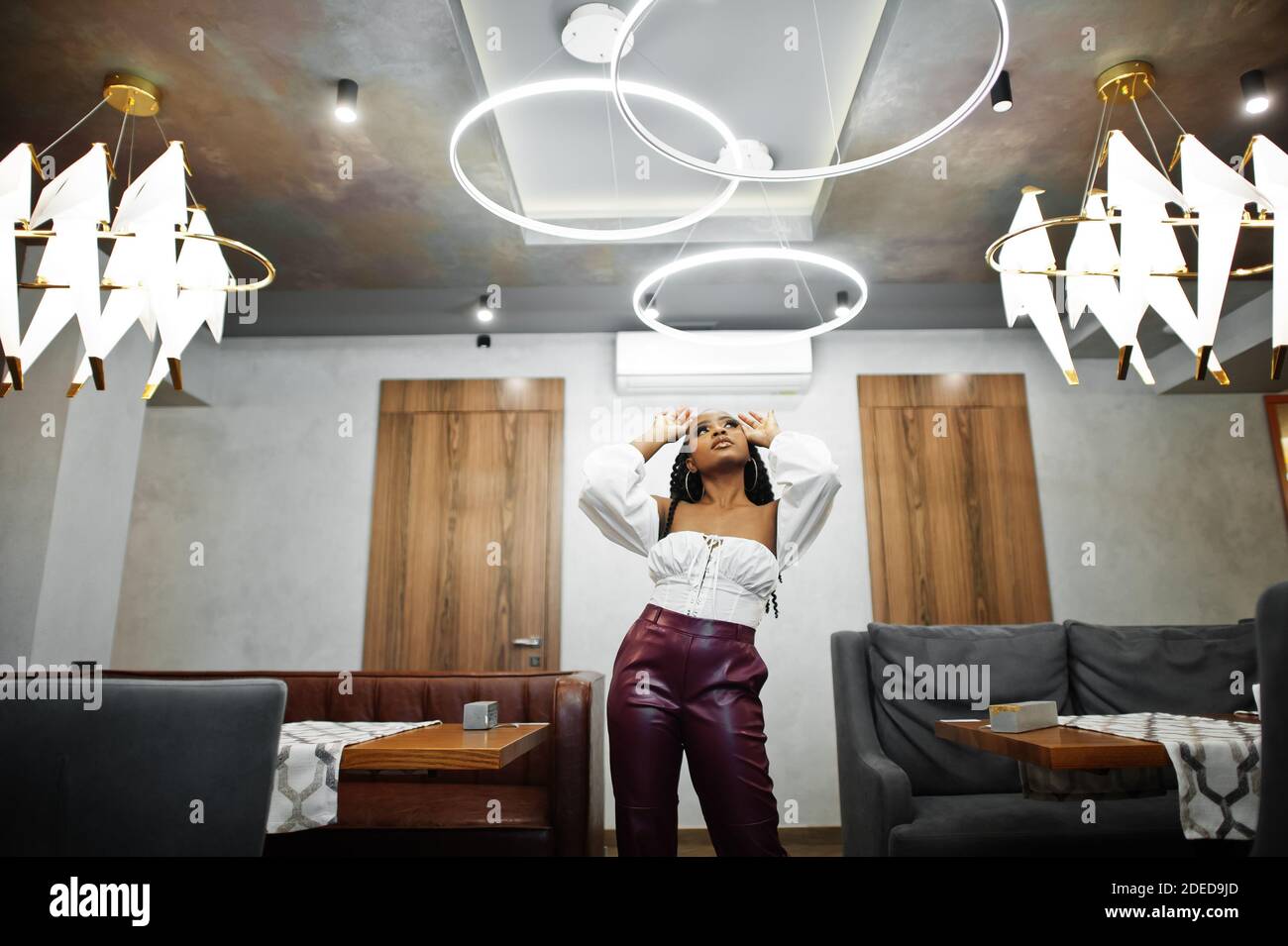 Mature woman leather pants hi-res stock photography and images - Alamy