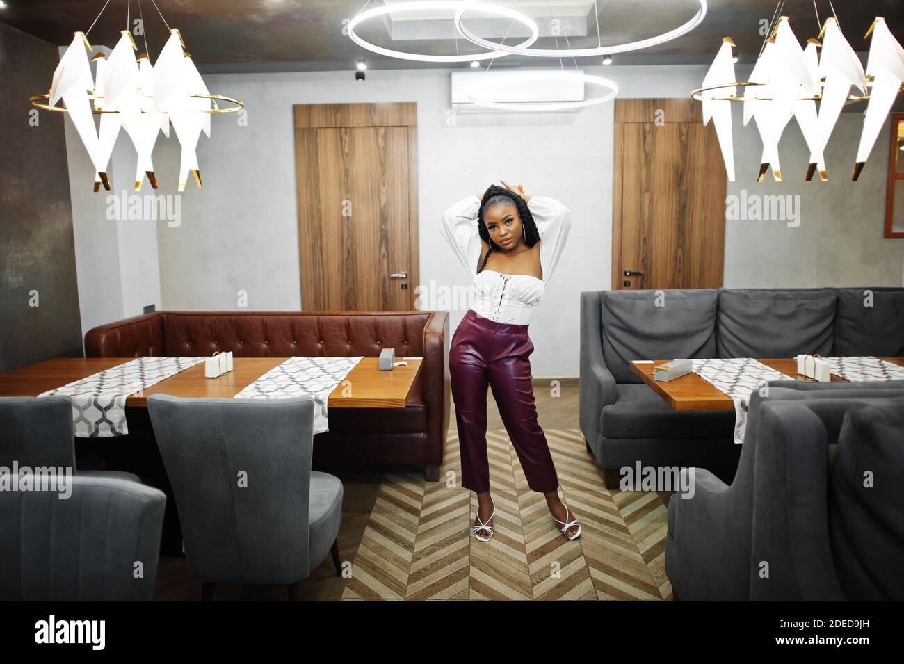 Mature woman leather pants hi-res stock photography and images - Alamy