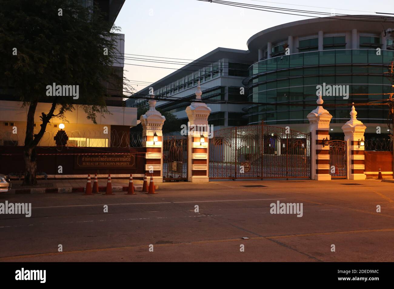 Police gather on Phitsanulok road outside the Crown Property Bureau in Bangkok in case protestors choose to gather. Stock Photo