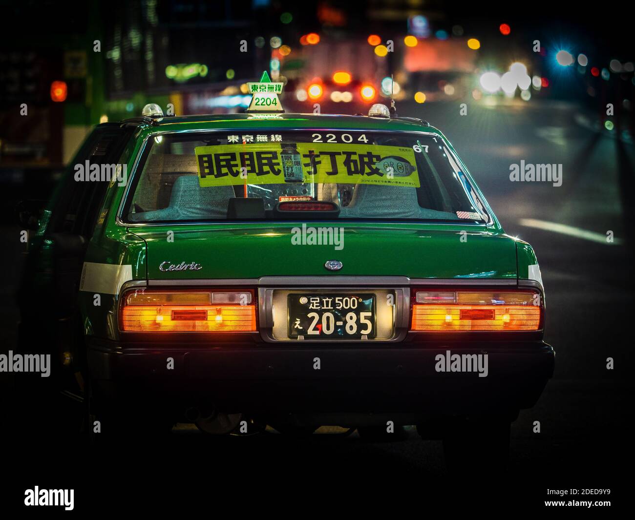 Tokyo Taxi at night with illuminated sign.  Tokyo Night Taxi. Stock Photo